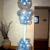 This column is topped with a gumball featuring a clear balloon printed with snowflakes all-around.